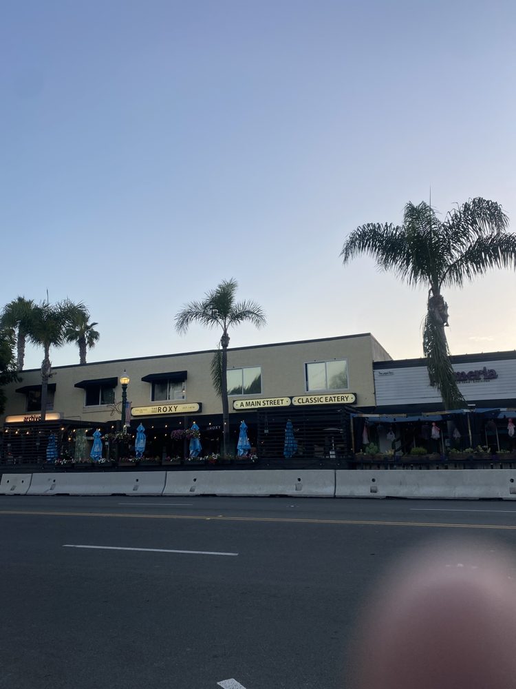 The Roxy's 'Est. 1978' and 'A Main Street Classic Eatery' signs over its patio