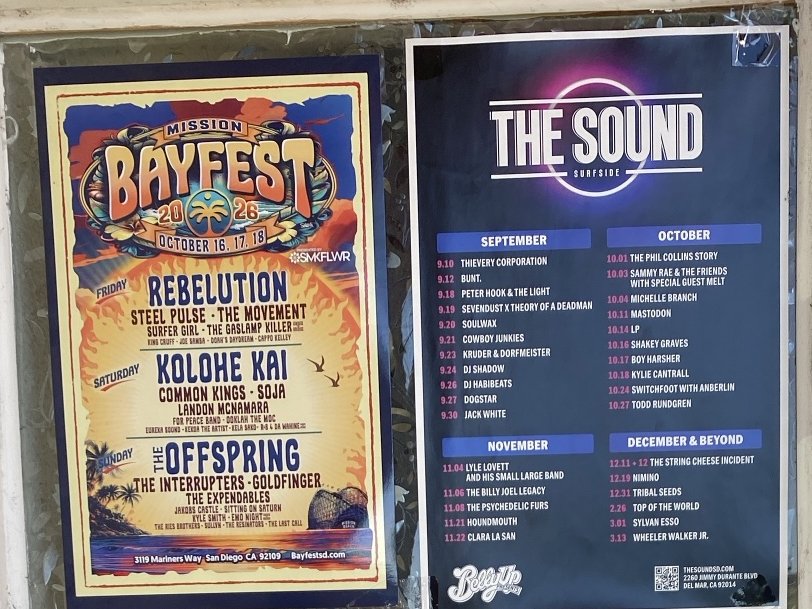 Two posters in a window: Mission Bayfest 2026 and The Sound's fall lineup, September through March, from Belly Up